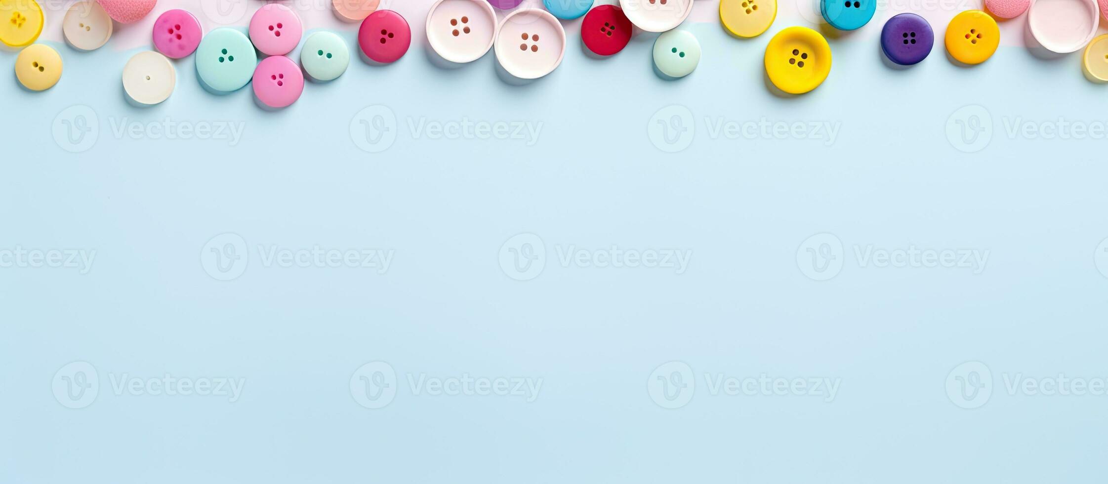 Photo of a vibrant collection of buttons on a captivating blue backdrop with copy space