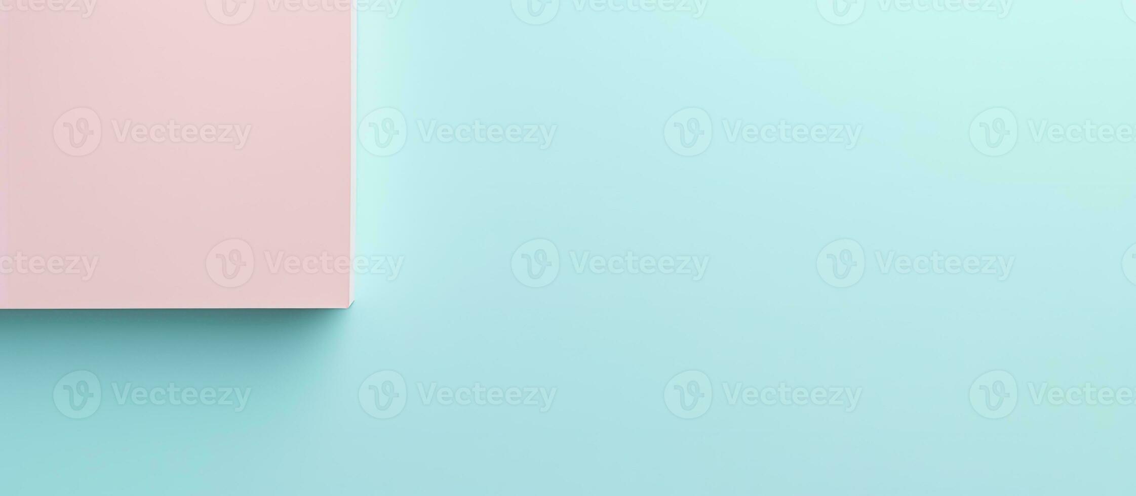 Photo of a pink square object on a vibrant blue and pink background with copy space