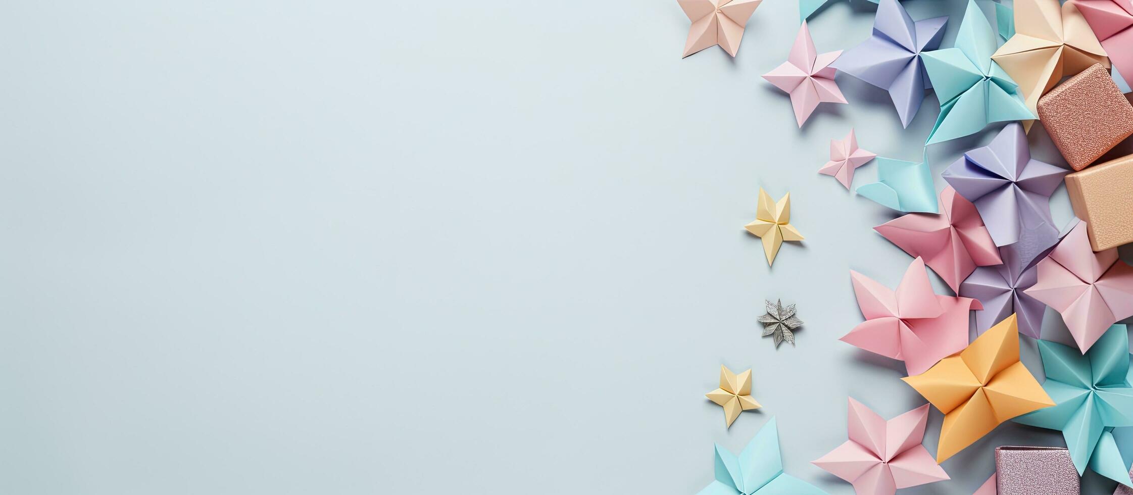 Photo of origami stars on a vibrant blue background with copy space