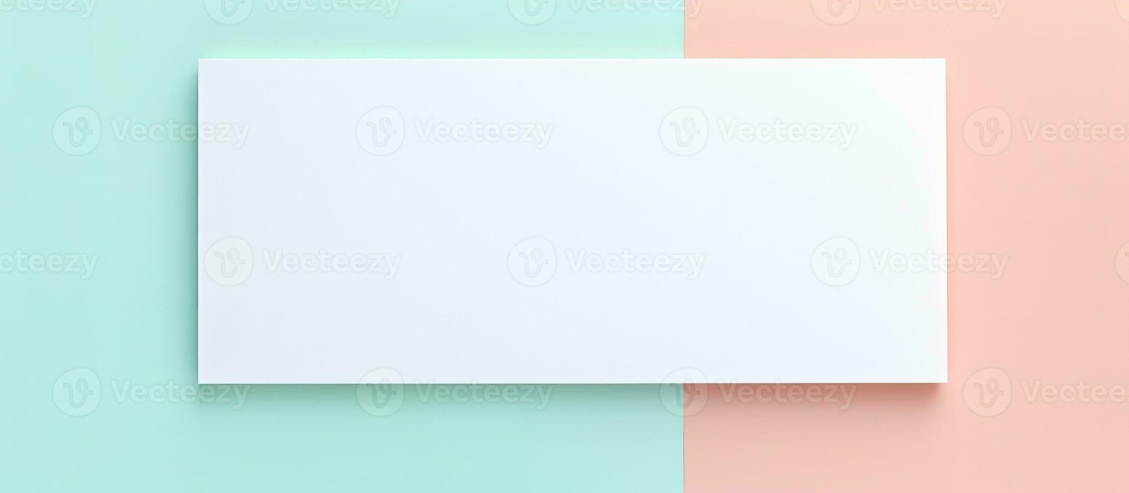 Photo of a minimalistic white square on a soft pastel pink and mint green backdrop with copy space