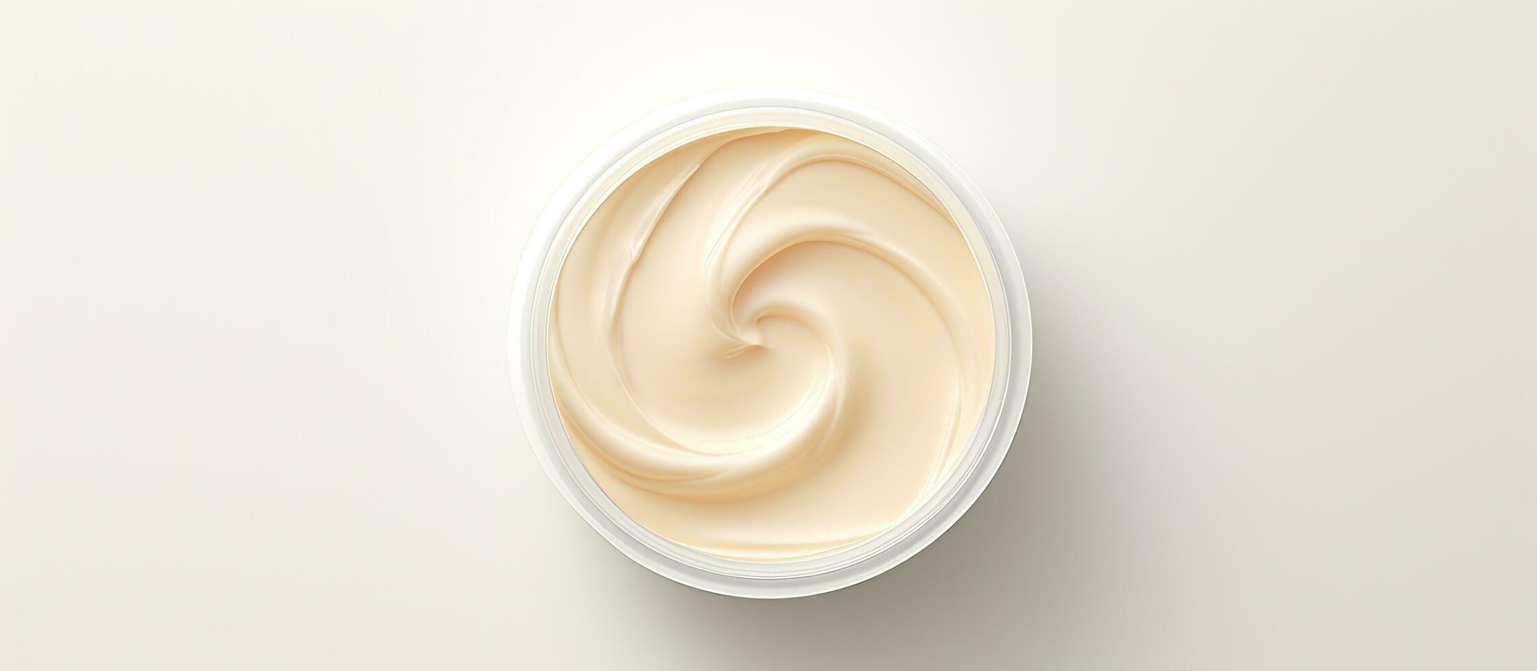 Photo of a cup of cream on a clean white surface with empty space for text or other elements with copy space