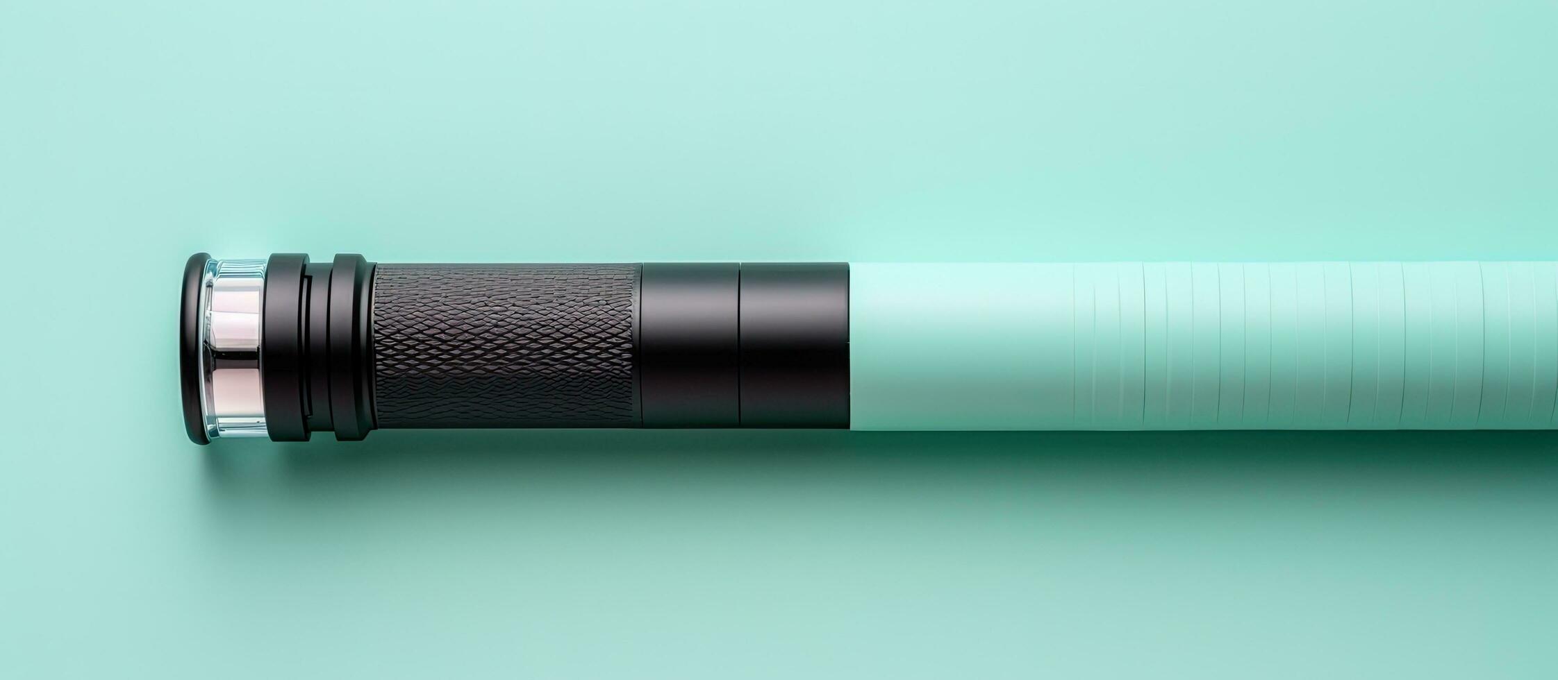 Photo of a pen resting on a table, ready to be used for writing or creating with copy space