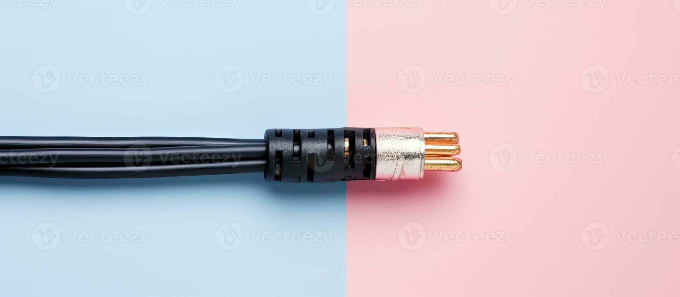 Photo of a black and white cable on a colorful background with copy space