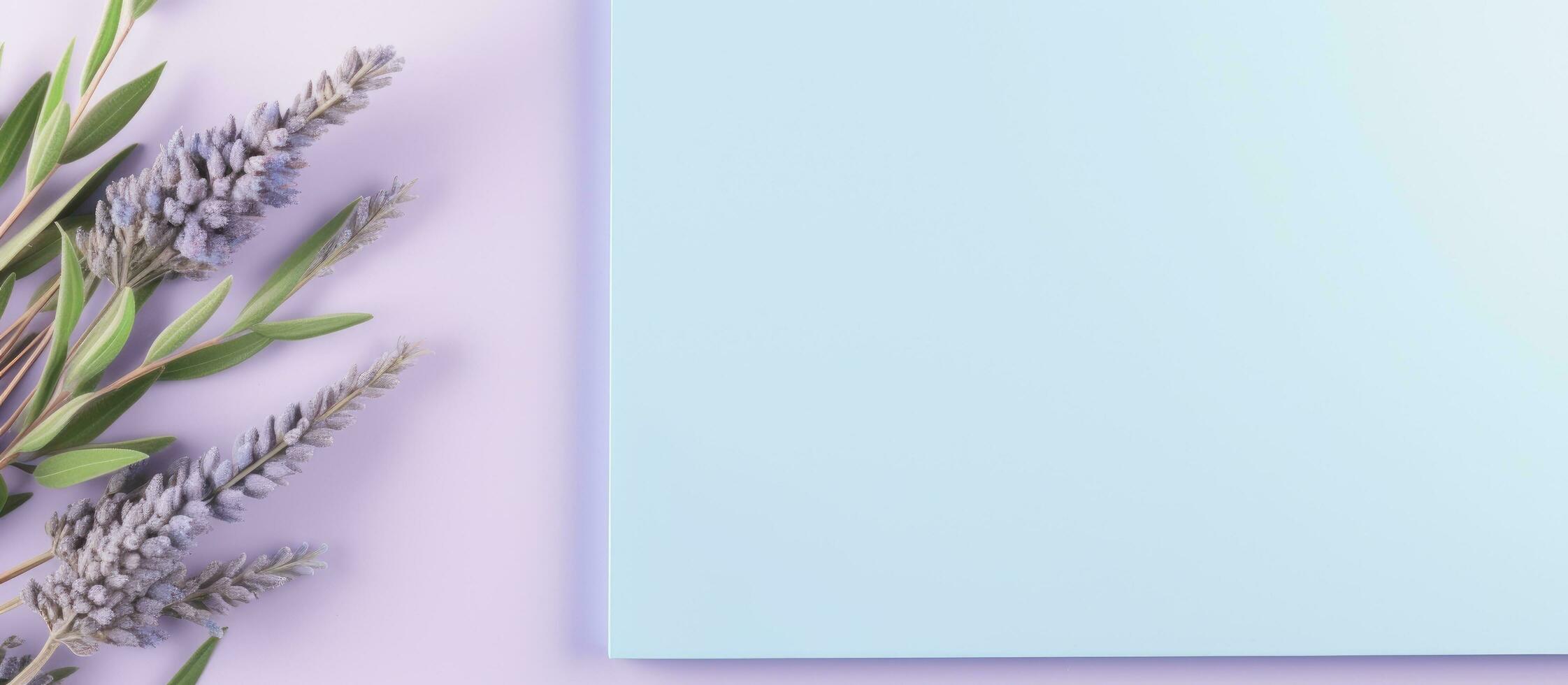 Photo of a blue paper with a beautiful arrangement of lavender flowers, perfect for adding a touch of elegance to any design with copy space