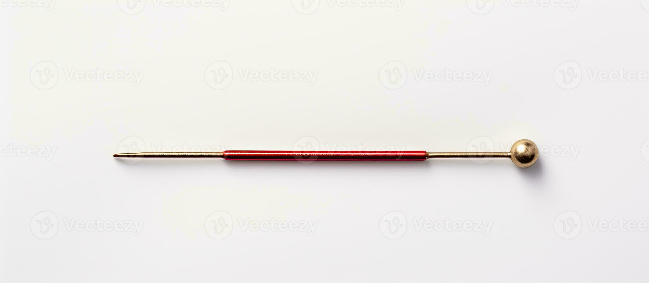 Photo of a vibrant red and gold pin on a clean white background with copy space