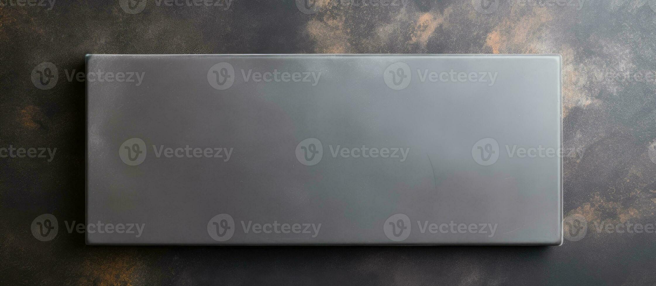 Photo of a square metal object mounted on a wall with copy space with copy space