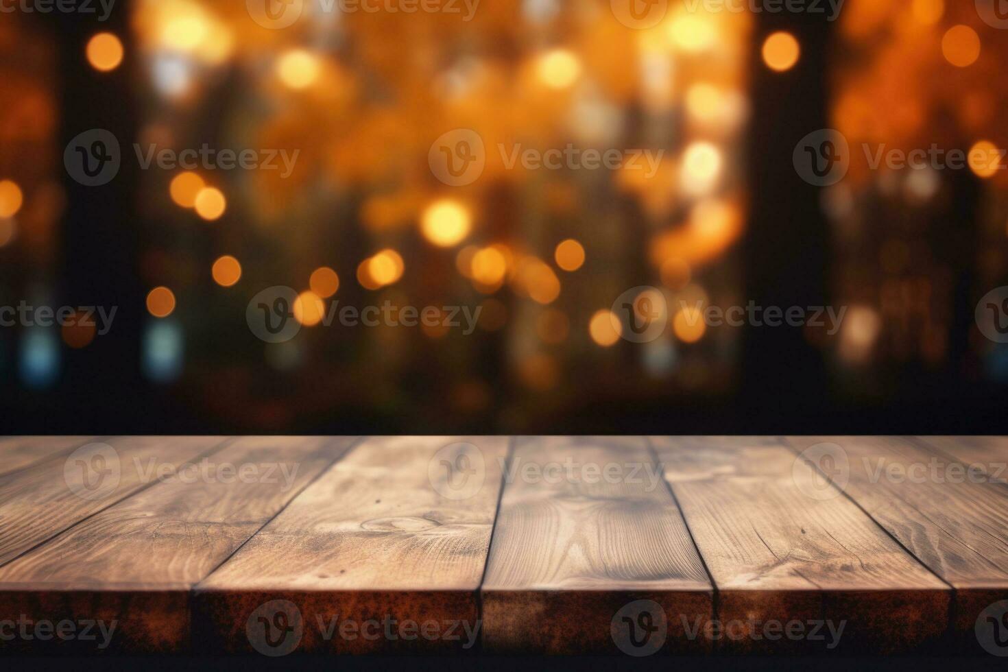 Empty dark wood table top with blurred bright Thanksgiving