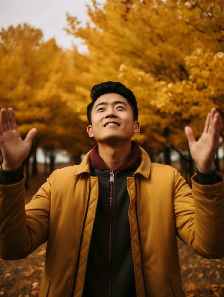 photo of emotional dynamic pose Asian man in autumn AI Generative