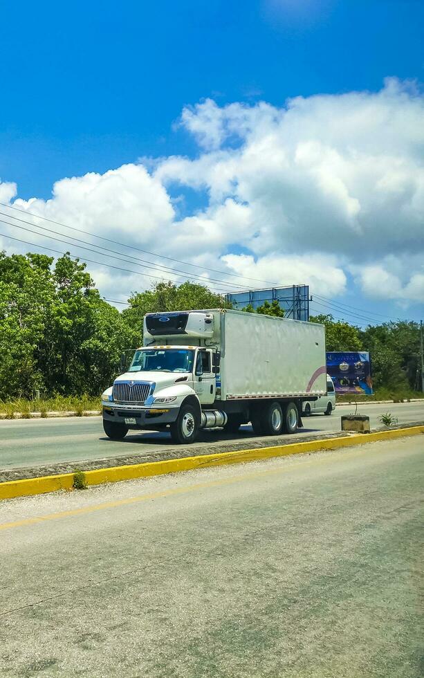 Playa del Carmen Qiuntana Roo Mexico 2023 Various Mexican trucks transporters vans delivery cars in Mexico. photo