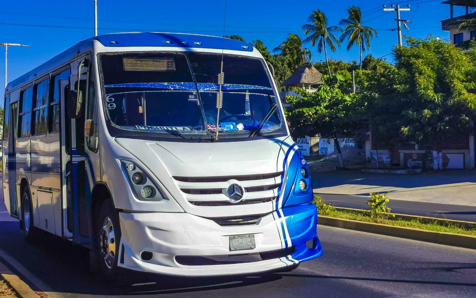 Puerto Escondido Oaxaca Mexico 2023 Various colorful buses tour bus transport in Puerto Escondido Mexico. photo