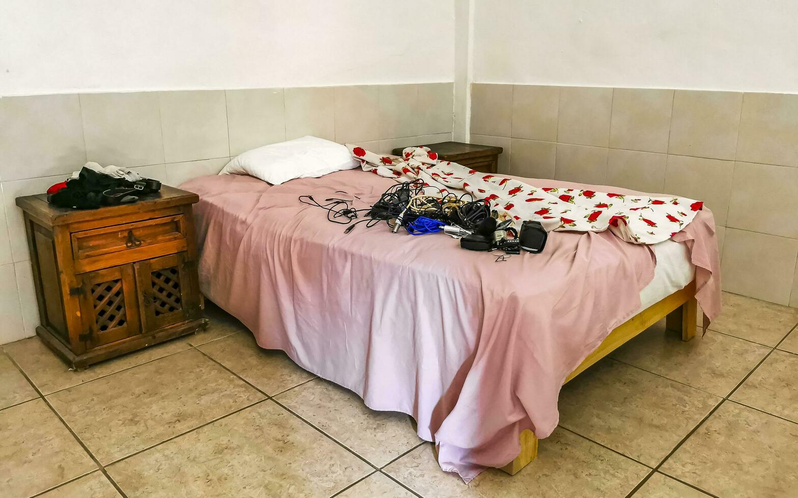 Playa del Carmen Quintana Roo Mexico 2023 Simple small apartment hotel room with bed table in Mexico. photo