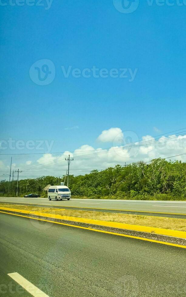 Busy road street cars traffic jam Playa del Carmen Mexico. photo