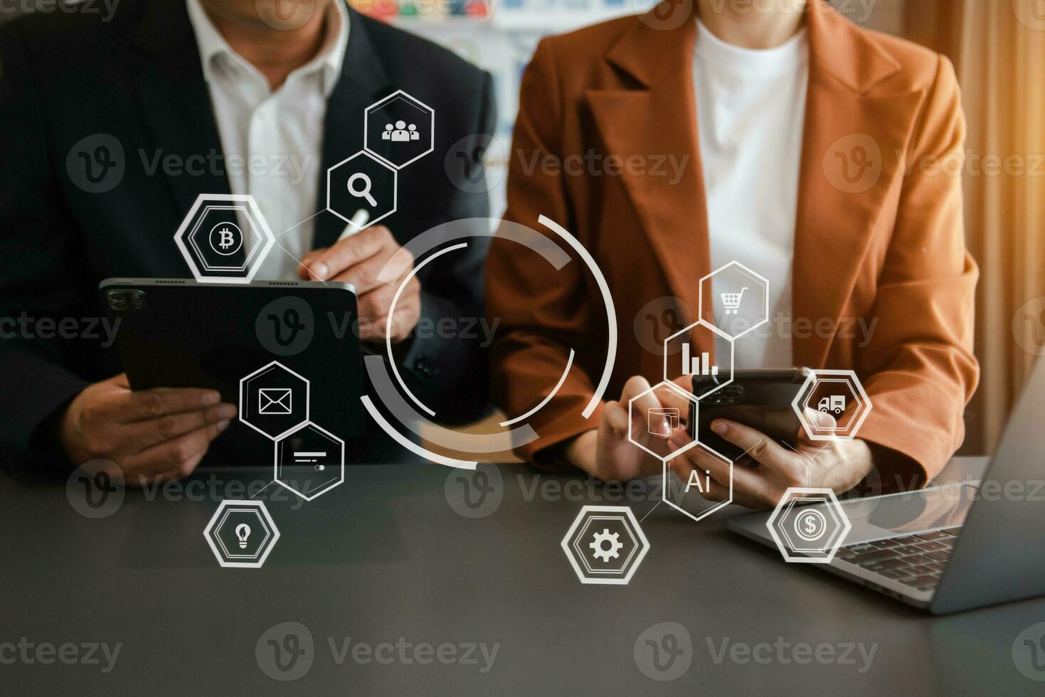 Co working team meeting concept,business with smart phone and laptop and digital tablet computer in office with virtual interface icons photo