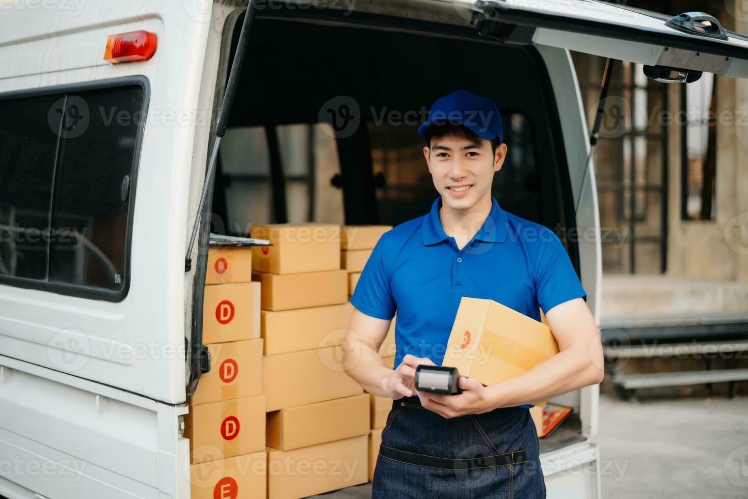 Portrait of courier delivery Asian man searching the address on digital tablet. Delivery service, delivery home and shipping concept. photo