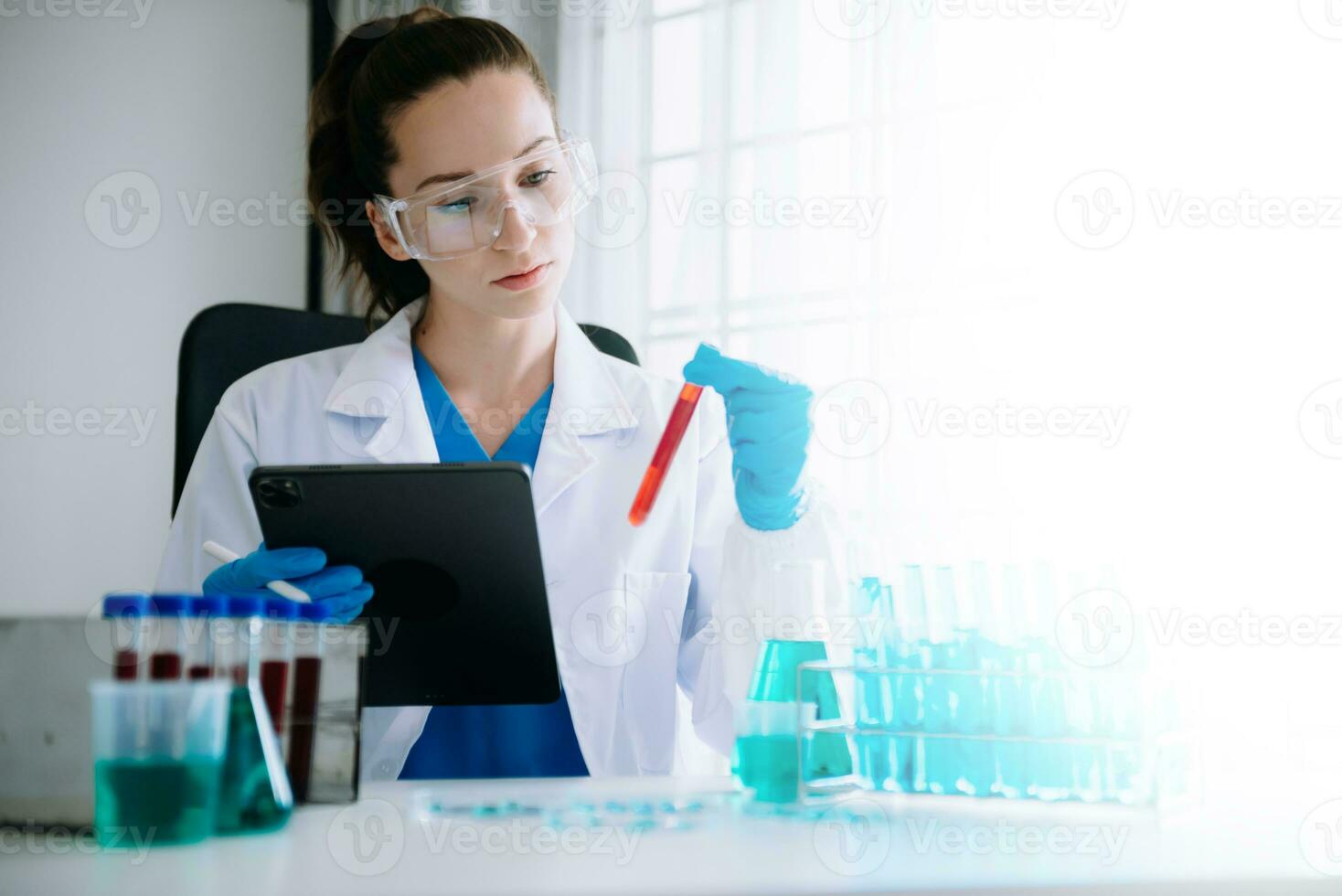 Dctor work on digital tablet healthcare doctor technology tablet using computer  in laboratory study with virtual icon photo