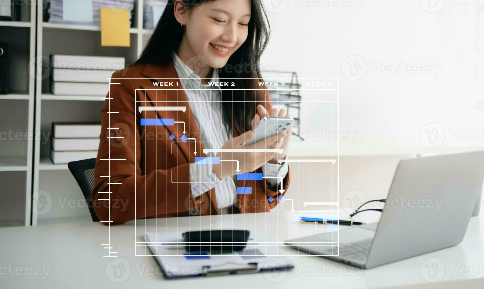 Project manager working and update tasks with milestones progress planning and Gantt chart scheduling diagram. business working with smart phone, tablet and laptop photo