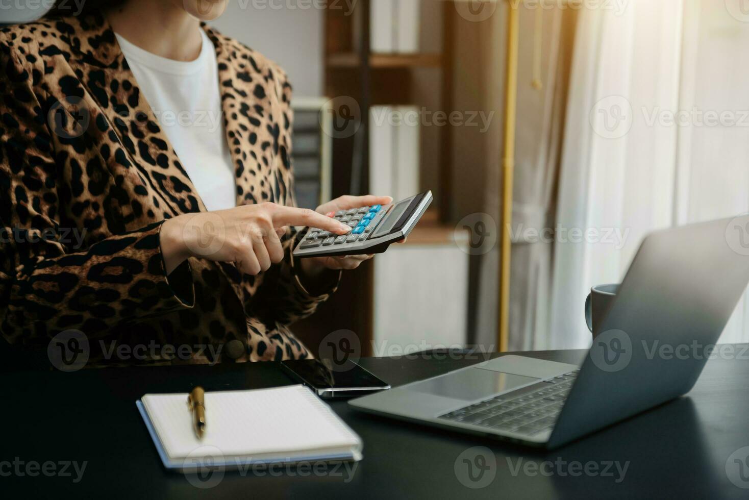 Businesswoman hand using laptop, tablet and smartphone in office. Digital marketing media mobile app and discussing plan new start up project. photo