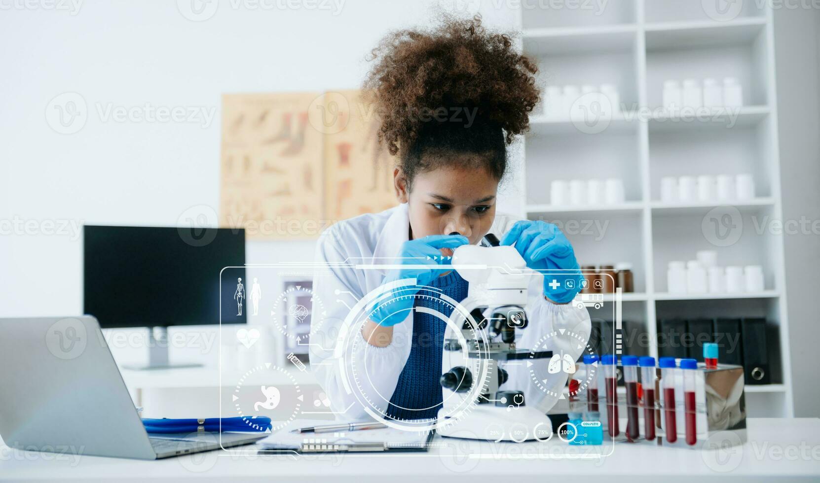 Young scientists conducting research investigations in a medical laboratory, a researcher in the foreground is using a microscope in laboratory for medicine. photo