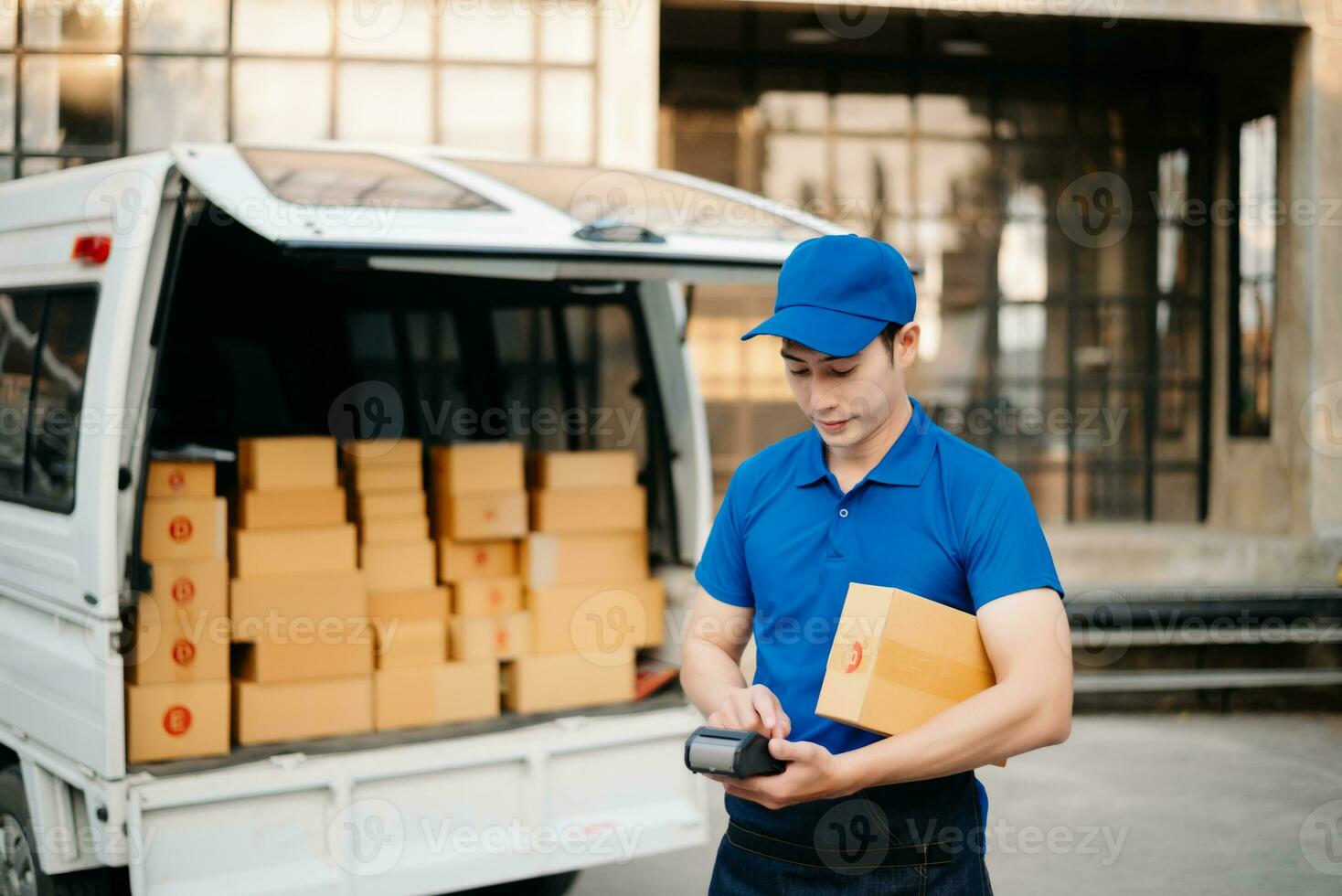 Portrait of courier delivery Asian man searching the address on digital tablet. Delivery service, delivery home and shipping concept. photo