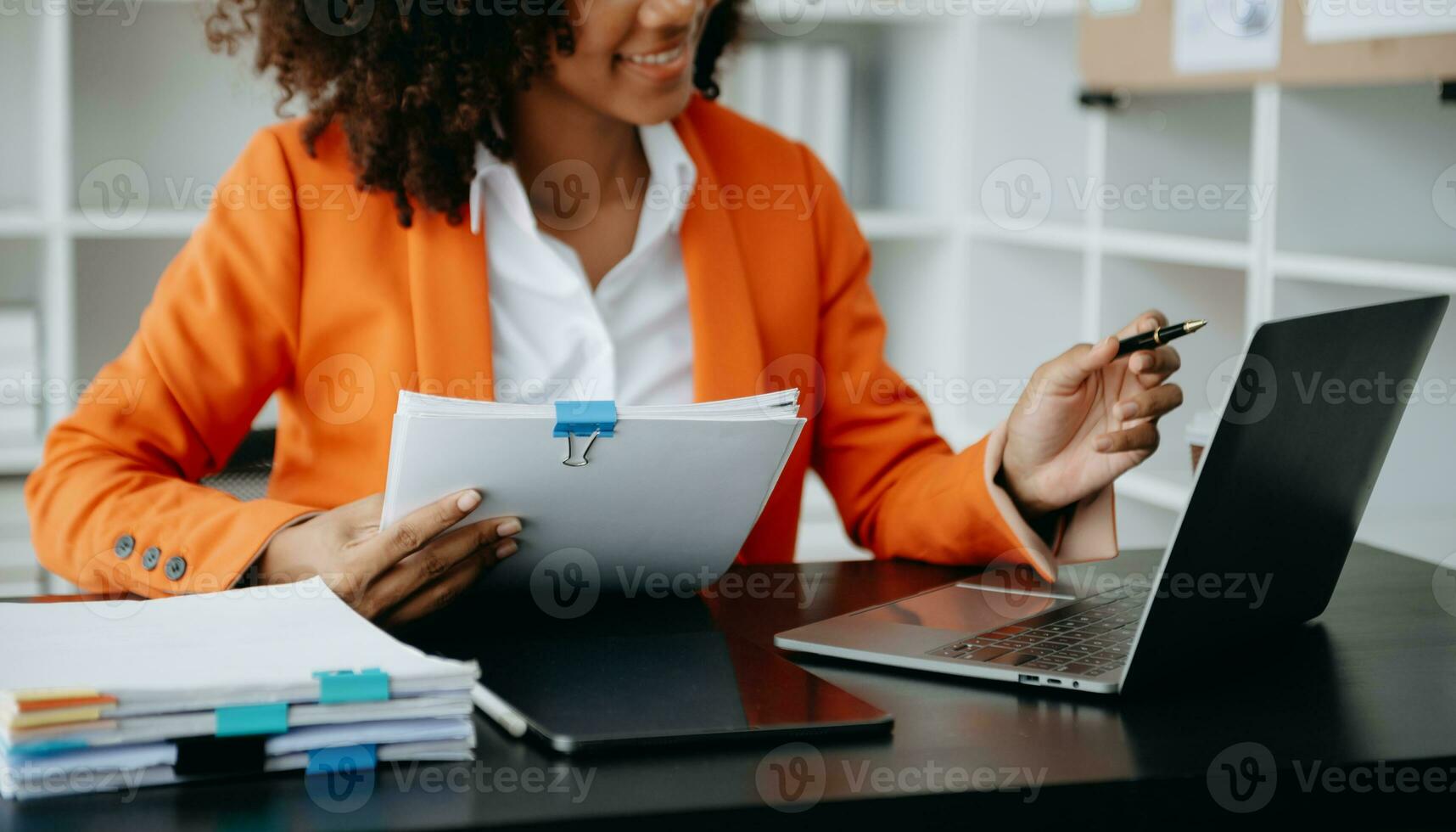 Businesswoman hand using laptop, tablet and smartphone in office. Digital marketing media mobile app and discussing plan new start up project. Finance task. photo