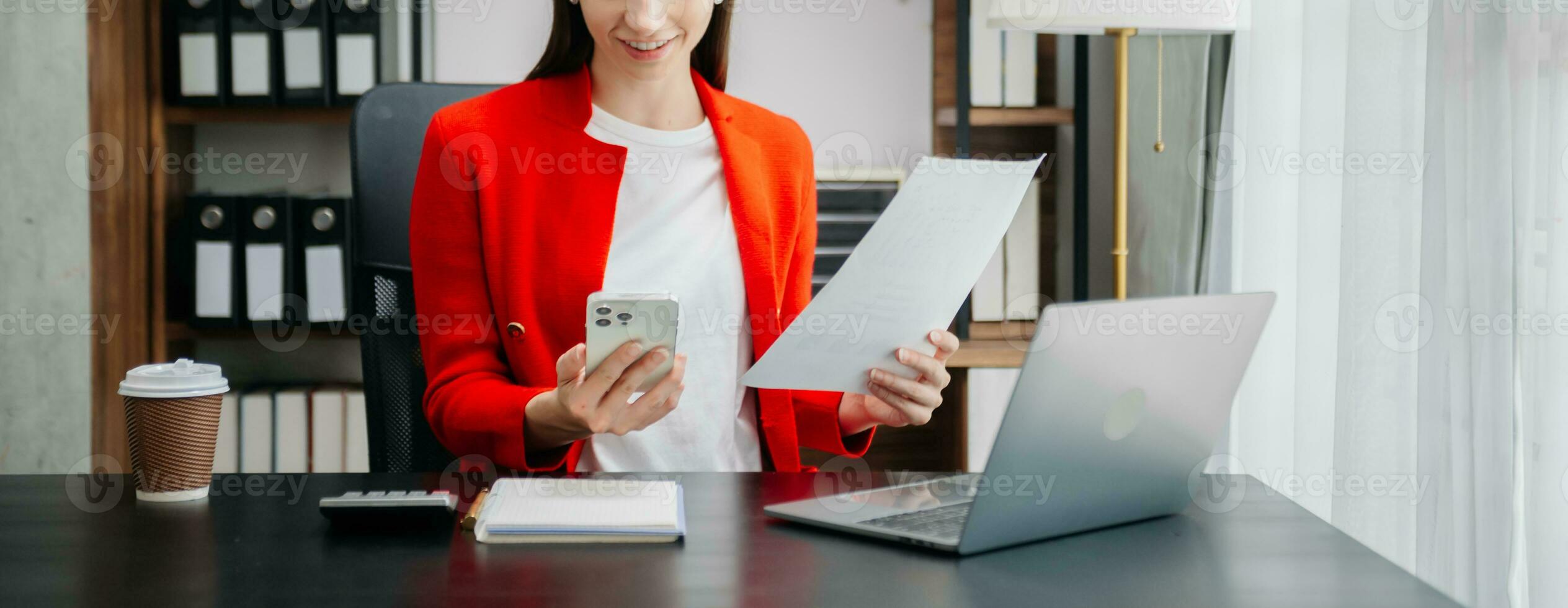 Businesswoman hand using laptop, tablet and smartphone in office. Digital marketing media mobile app and discussing plan new start up project. photo
