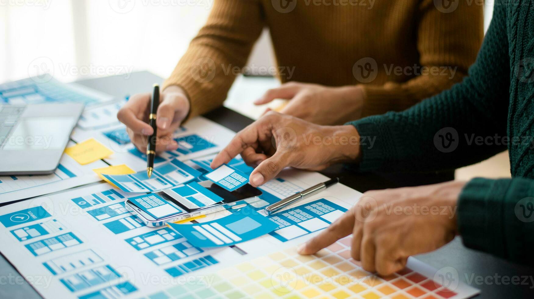 UX graphic designer planning application process development prototype wireframe for web smart phone. Creative digital development photo