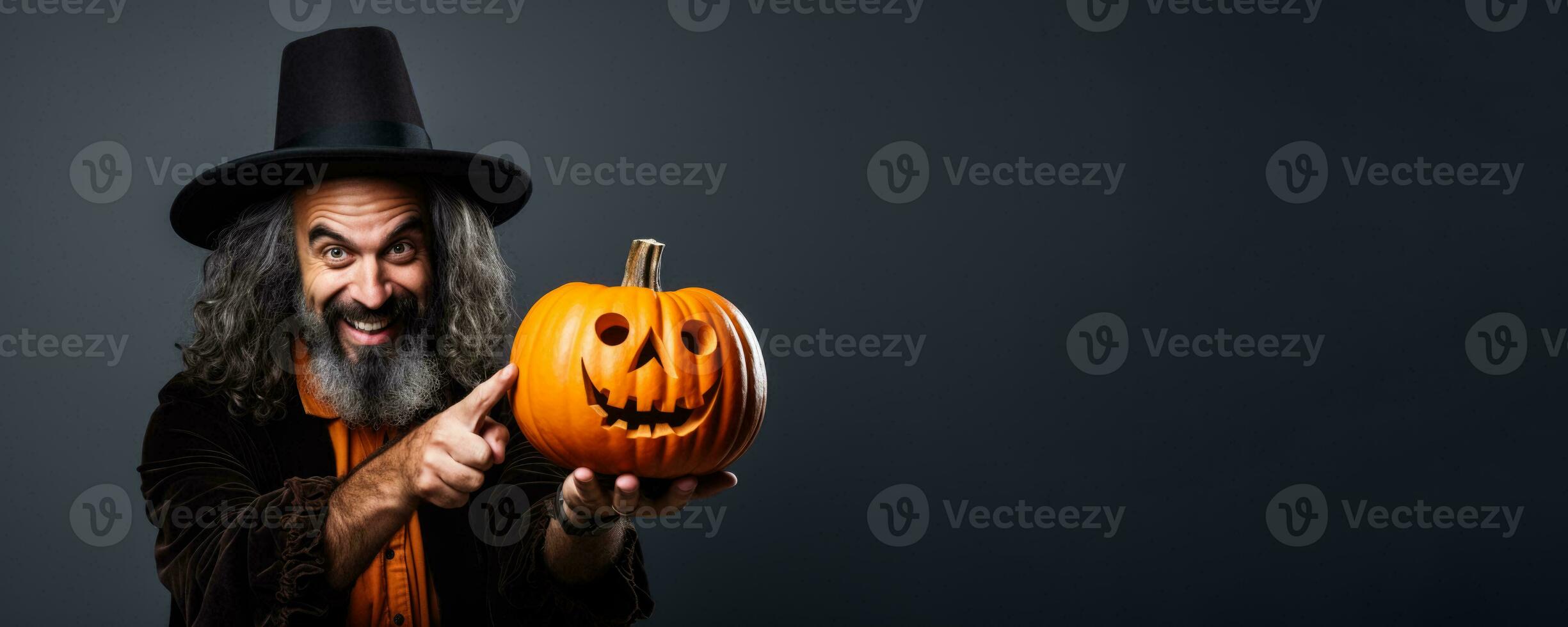 Archaeologist with a Halloween pumpkin on a solid background with empty space for text photo