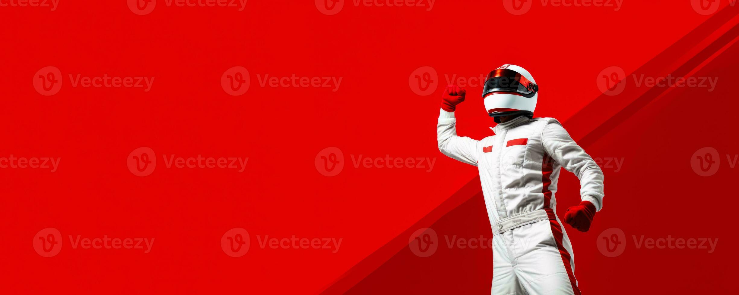 Race car driver triumphantly crossing the finish line on red background with empty space for text photo