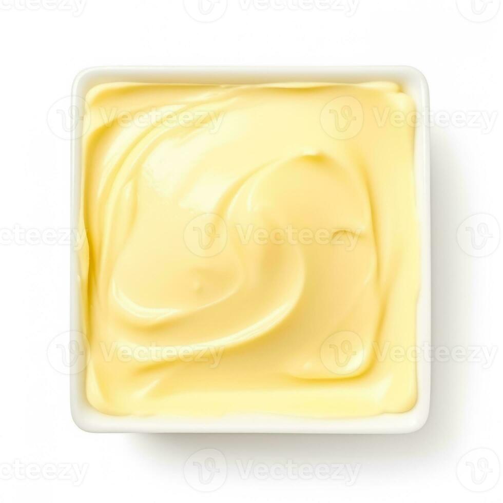 Butter softened top view isolated on white background photo