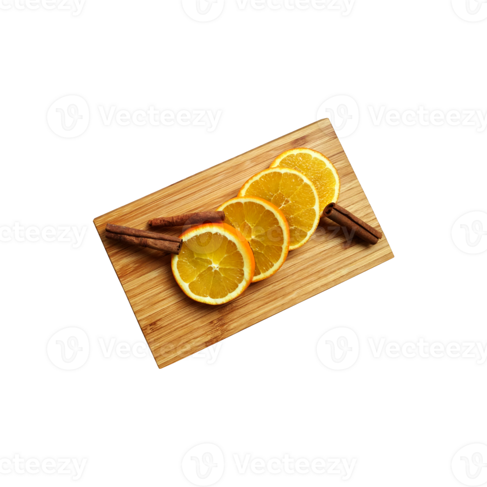 Orange fruit slices and cinnamon sticks on wooden cutting board top view flatlay, soft focus clipping path, organic healthy food diet concept png