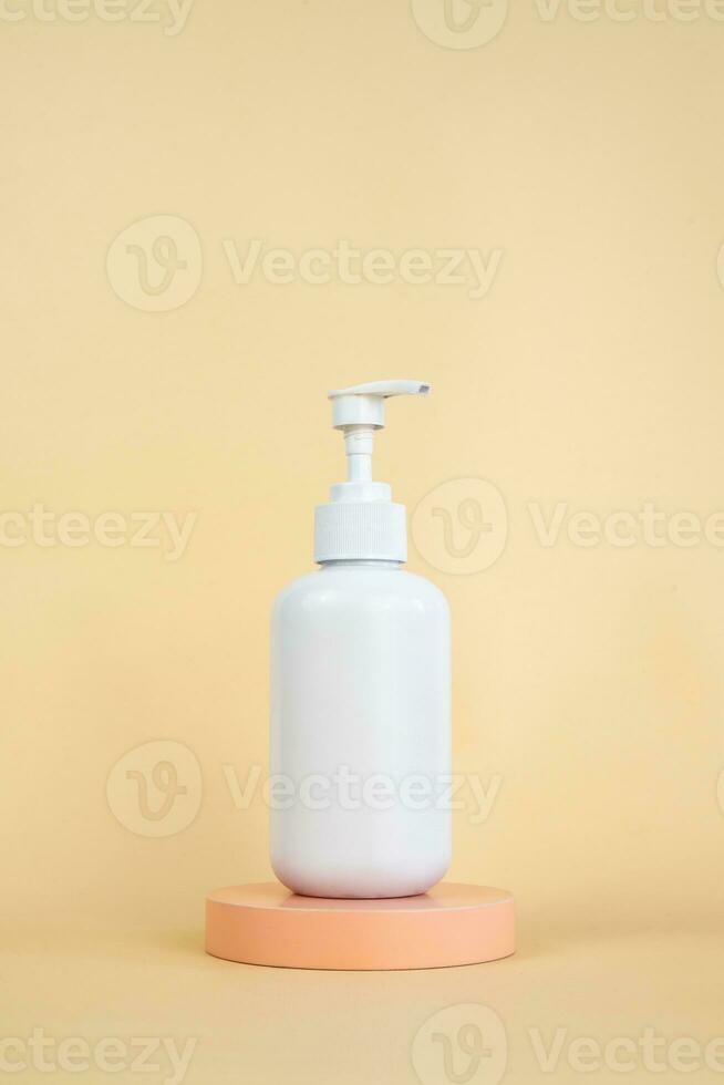 Soap bottle pump mockup on podium isolated photo