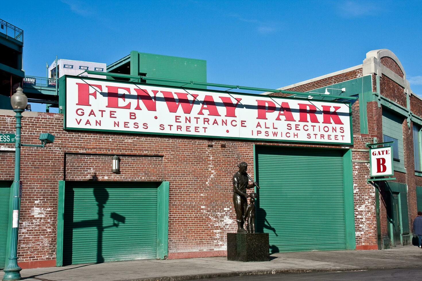 Boston, MA, USA January 10 2010 Statue of Ted Williams in front of one of the entrances at Fenway Park photo