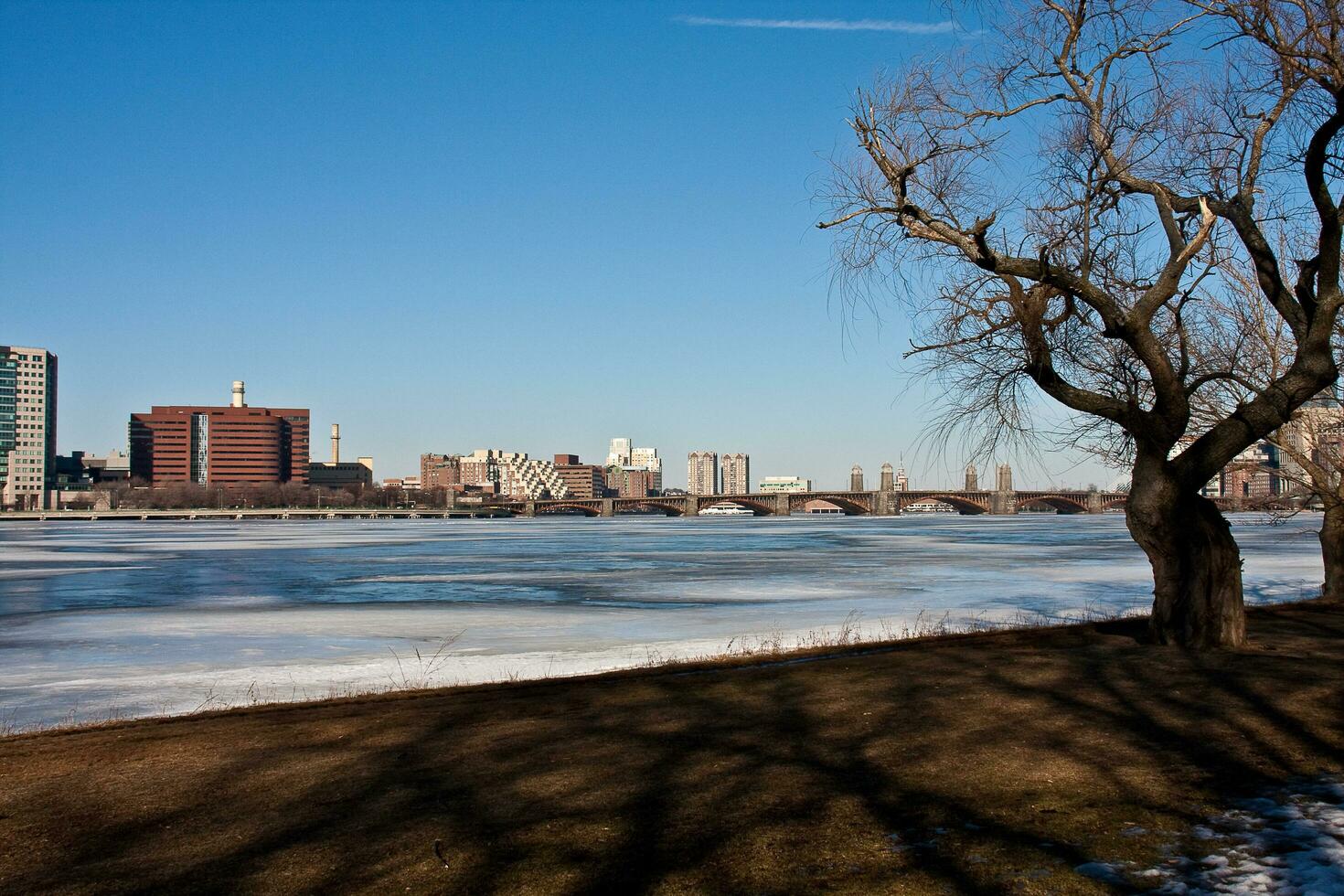 Boston, MA, USA January 10 2010   The frozen Charles River in winter time that separates Boston from Cambridge, MA photo