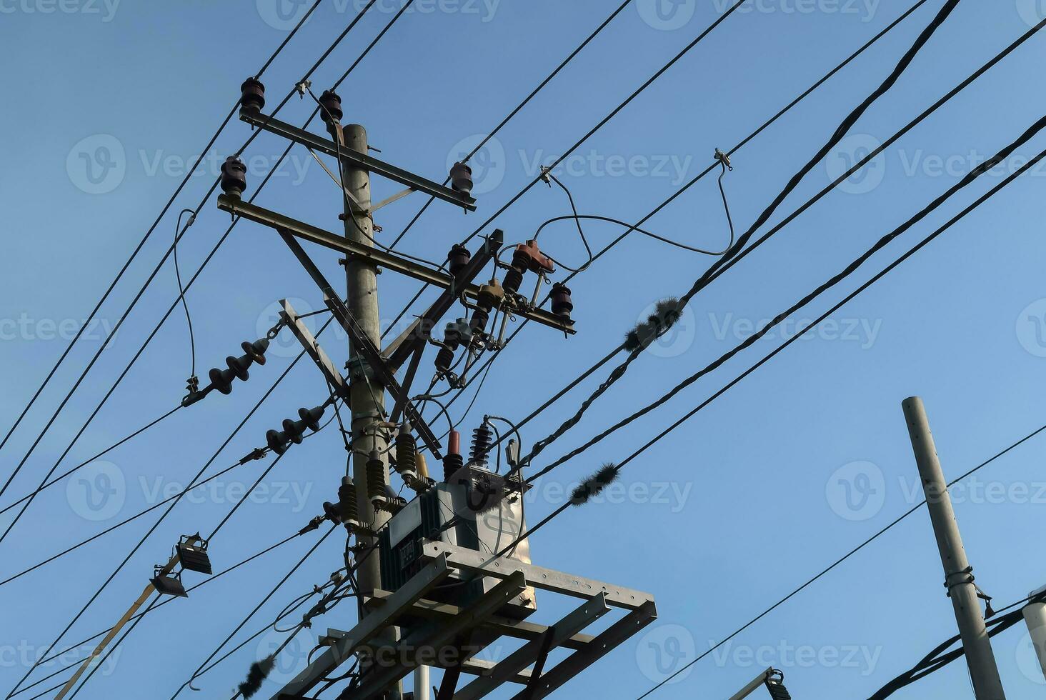 communication tower, electrical tower, power grip, telecommunication tower, mobile phone relay tower, with cables and other technological background photo