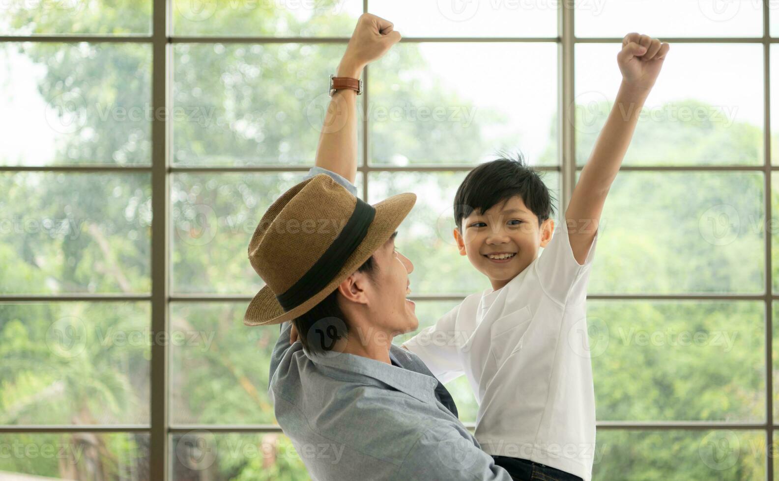 Father and son are happy and ready to travel on a weekend trip photo