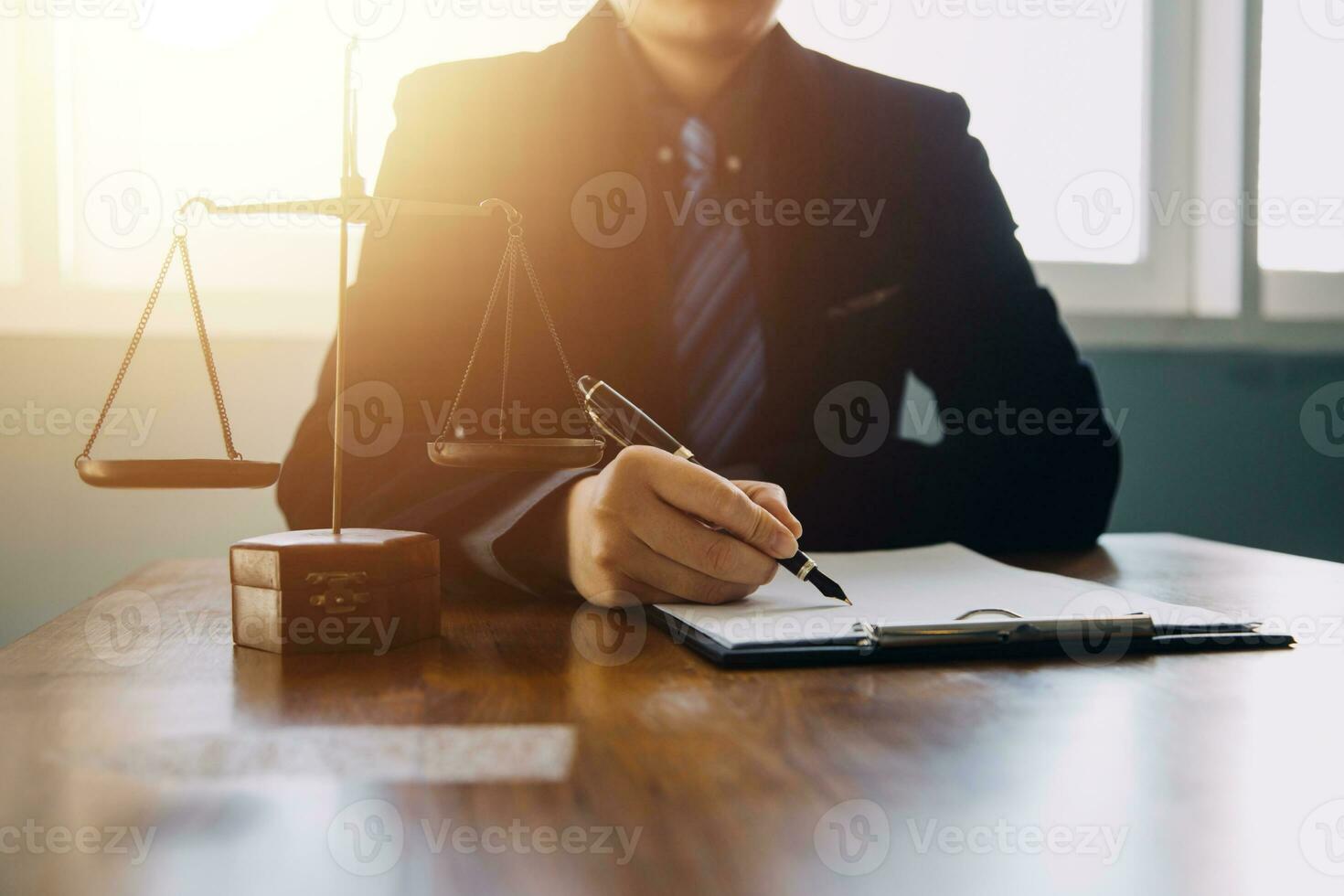 Businessman and Male lawyer or judge consult having team meeting with client, Law and Legal services concept. photo