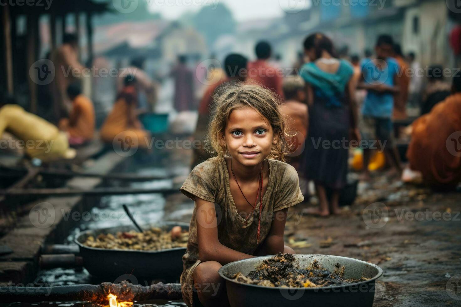 Hungry girl on the slum district photo