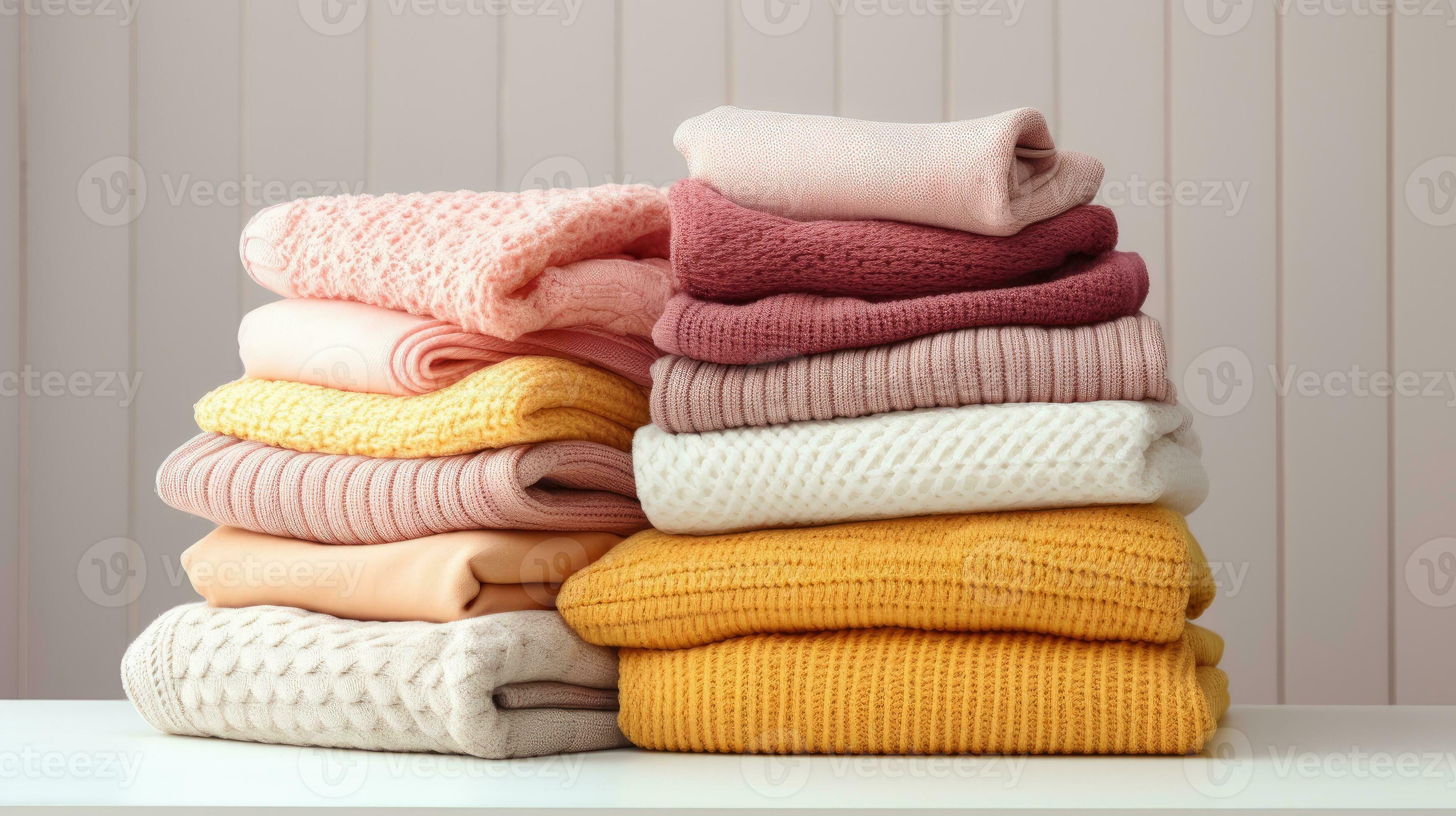 Knitted woolen clothes, after washing. close-up. Winter and autumn warm  cozy sweaters created with Generative Al technology 27016088 Stock Photo at  Vecteezy