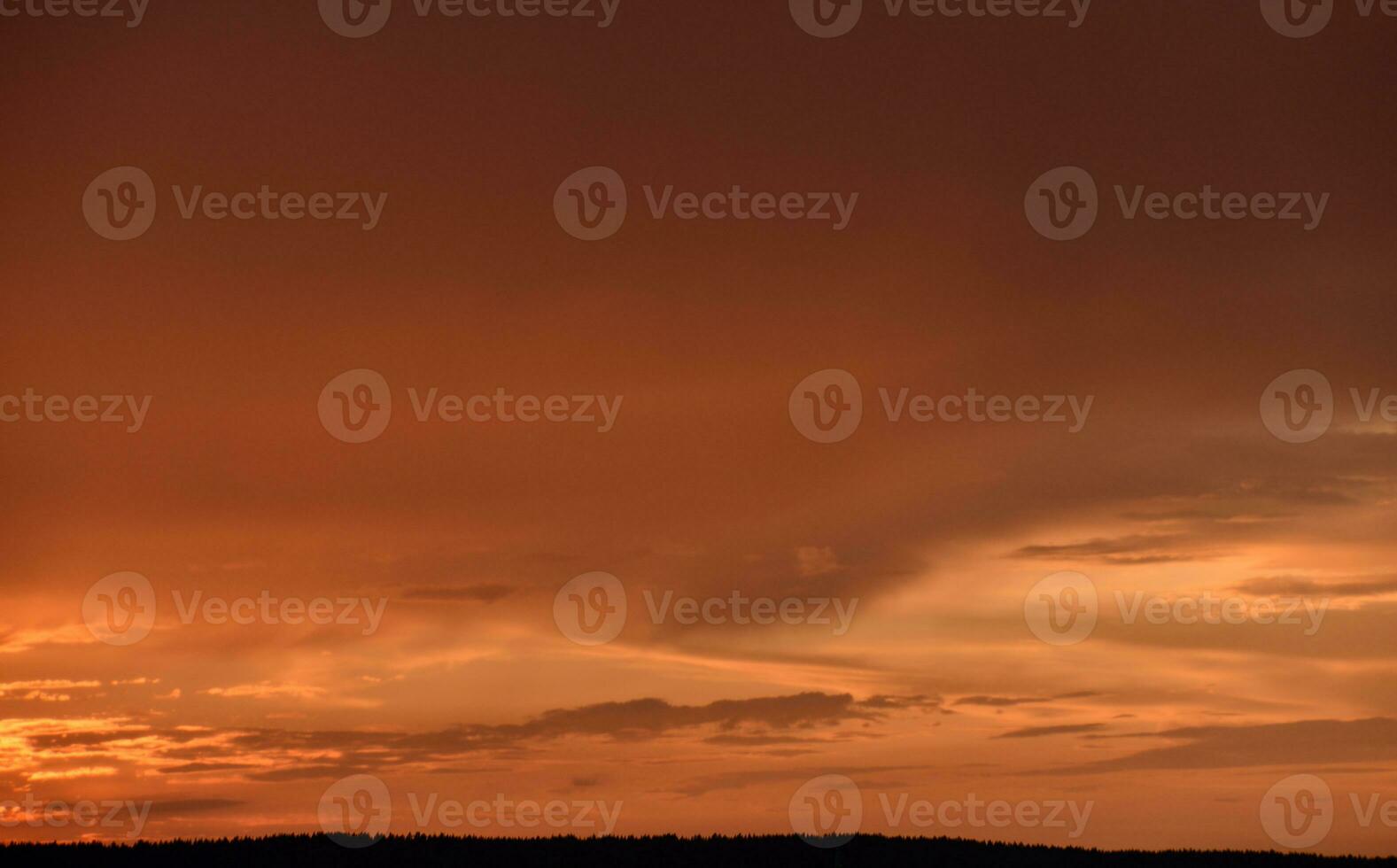 Pink clouds and evening sunset sky after a thunderstorm. Blue-red sunset evening. Beautiful pink clouds. photo