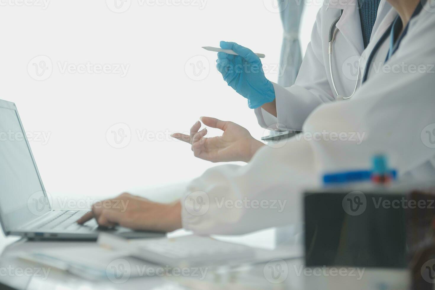 Team of Scientists Choose Between Printed Circuit Board to Work With. In The Background Technologically Advanced Scientific Research Center. photo