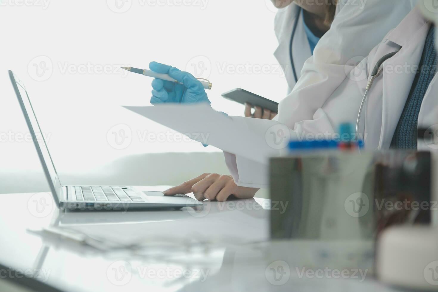 Team of Scientists Choose Between Printed Circuit Board to Work With. In The Background Technologically Advanced Scientific Research Center. photo