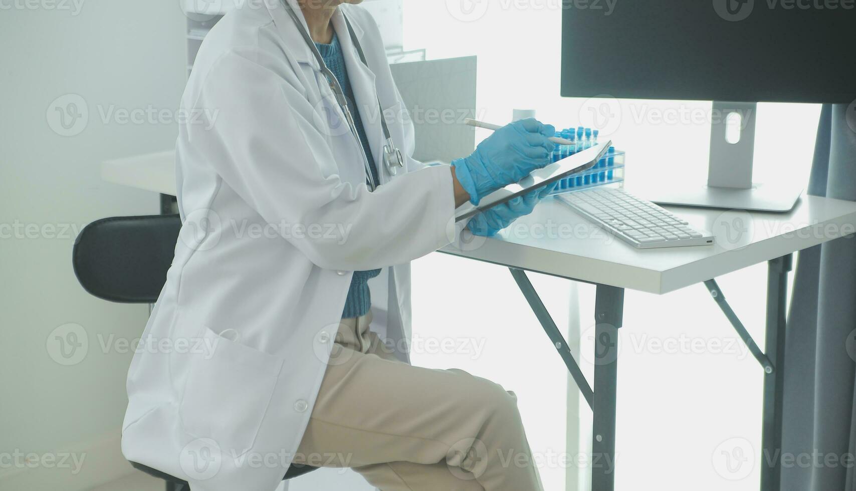 Team of Scientists Choose Between Printed Circuit Board to Work With. In The Background Technologically Advanced Scientific Research Center. photo