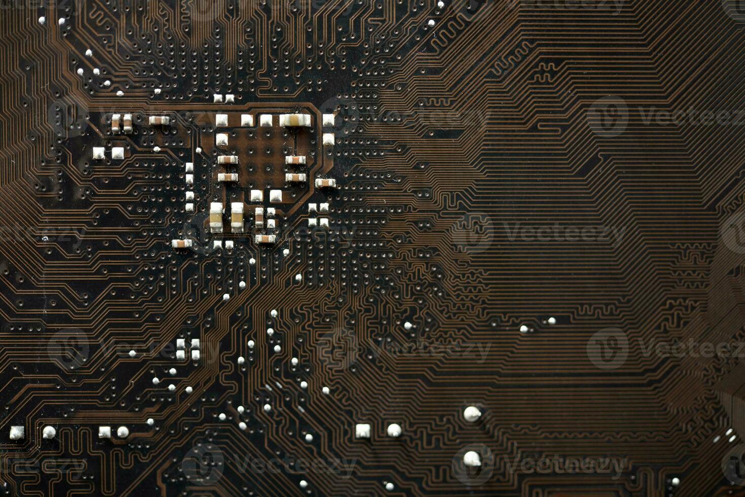 Brown electronic board with trace elements. Radio elements on the board. photo