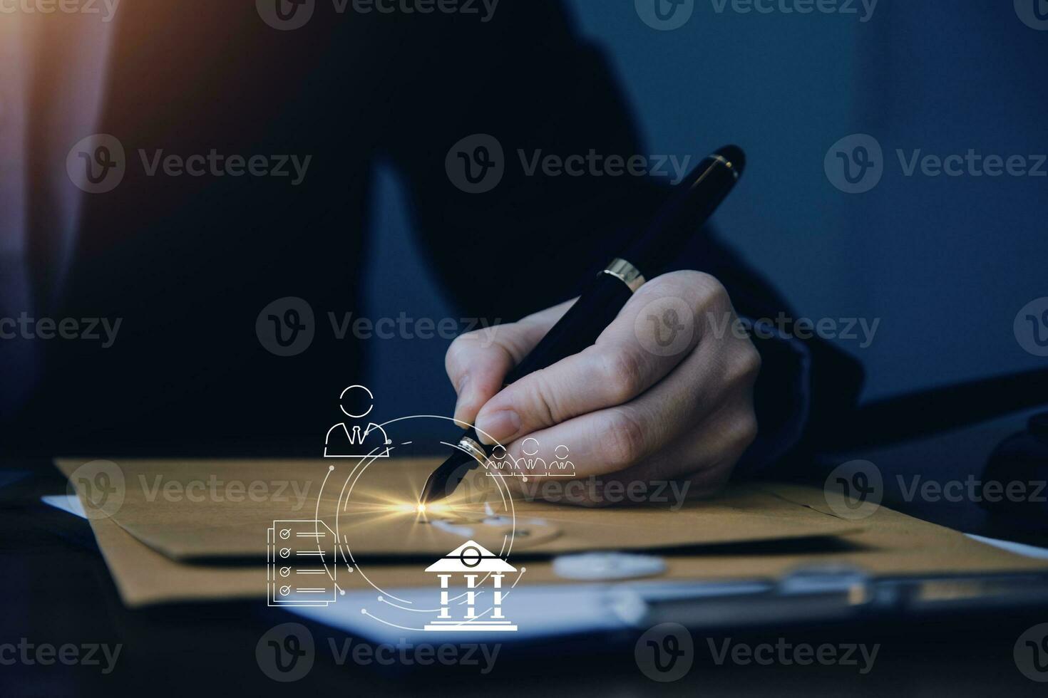 Justice and law concept.Male judge in a courtroom with the gavel, working with, computer and docking keyboard, eyeglasses, on table in morning light photo