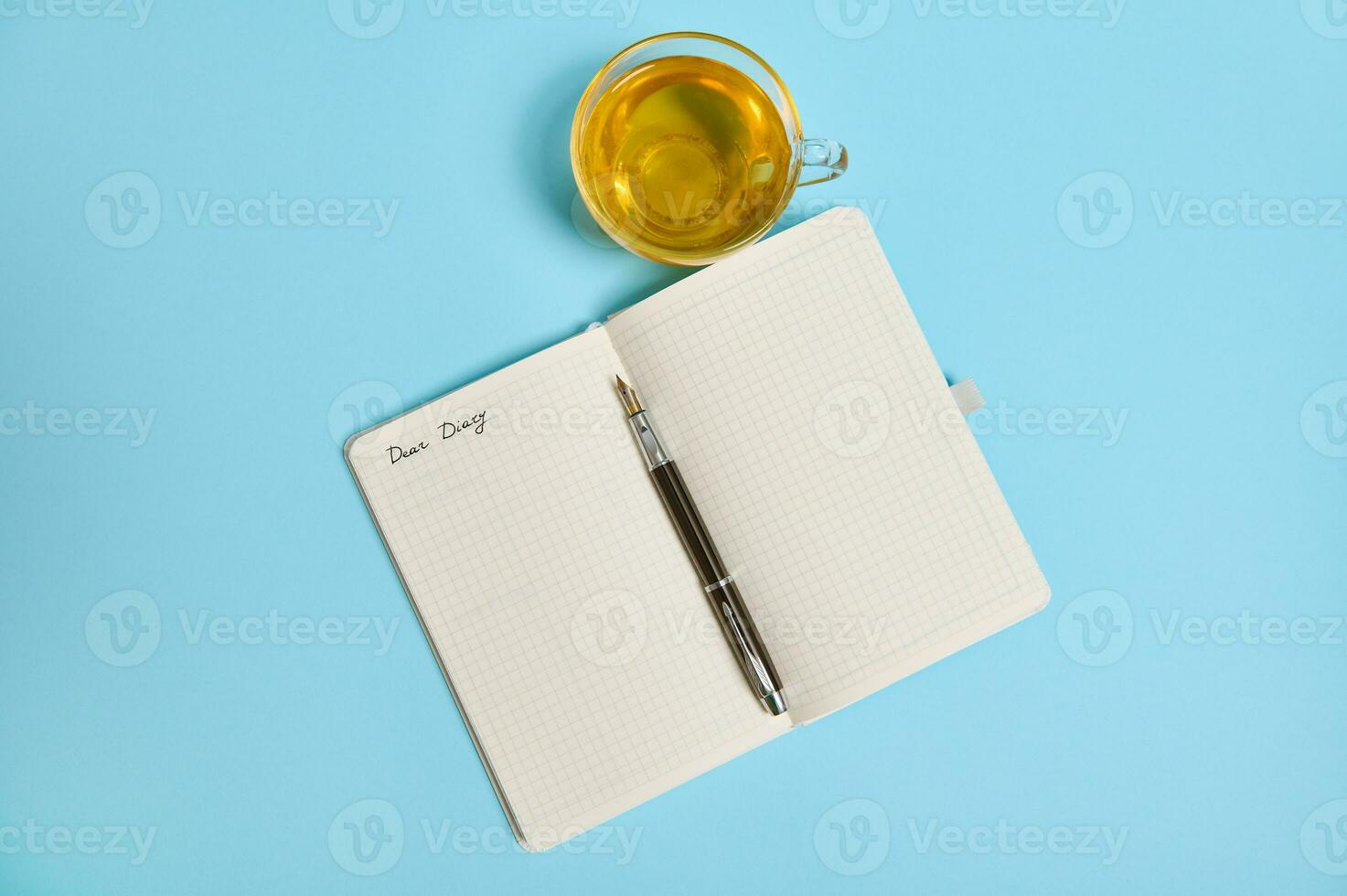 Top view of an empty notebook, scrapbook accessories and a cup of coffee on  a black background. 34225260 Stock Photo at Vecteezy