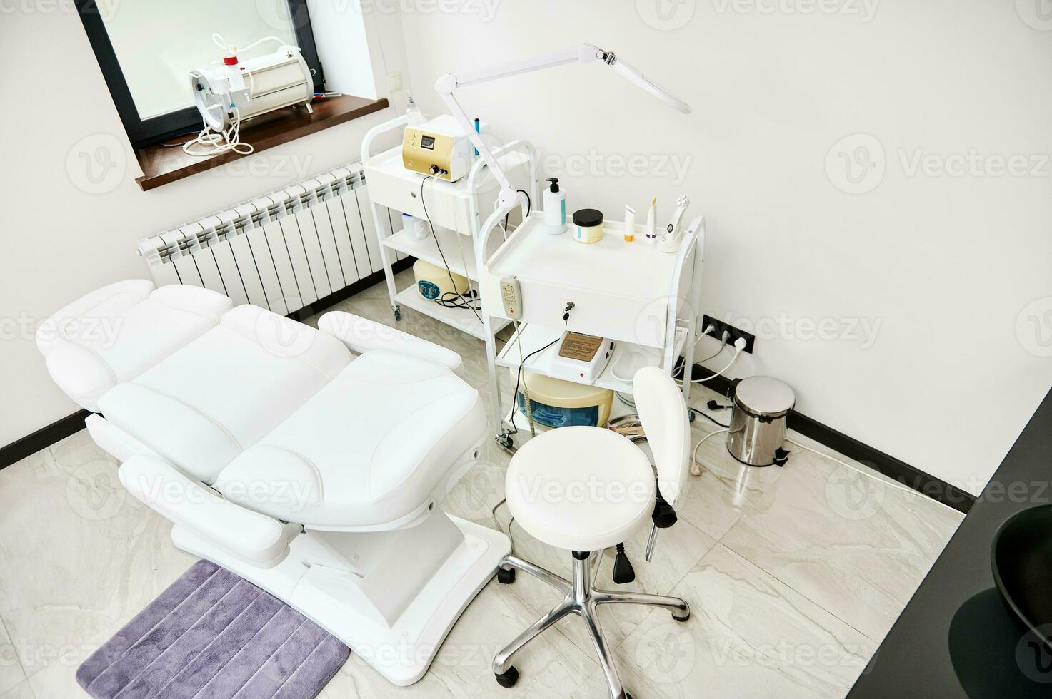 High angle view of a contemporary cosmetology room with professional equipment in dermatology and cosmetology SPA clinic photo