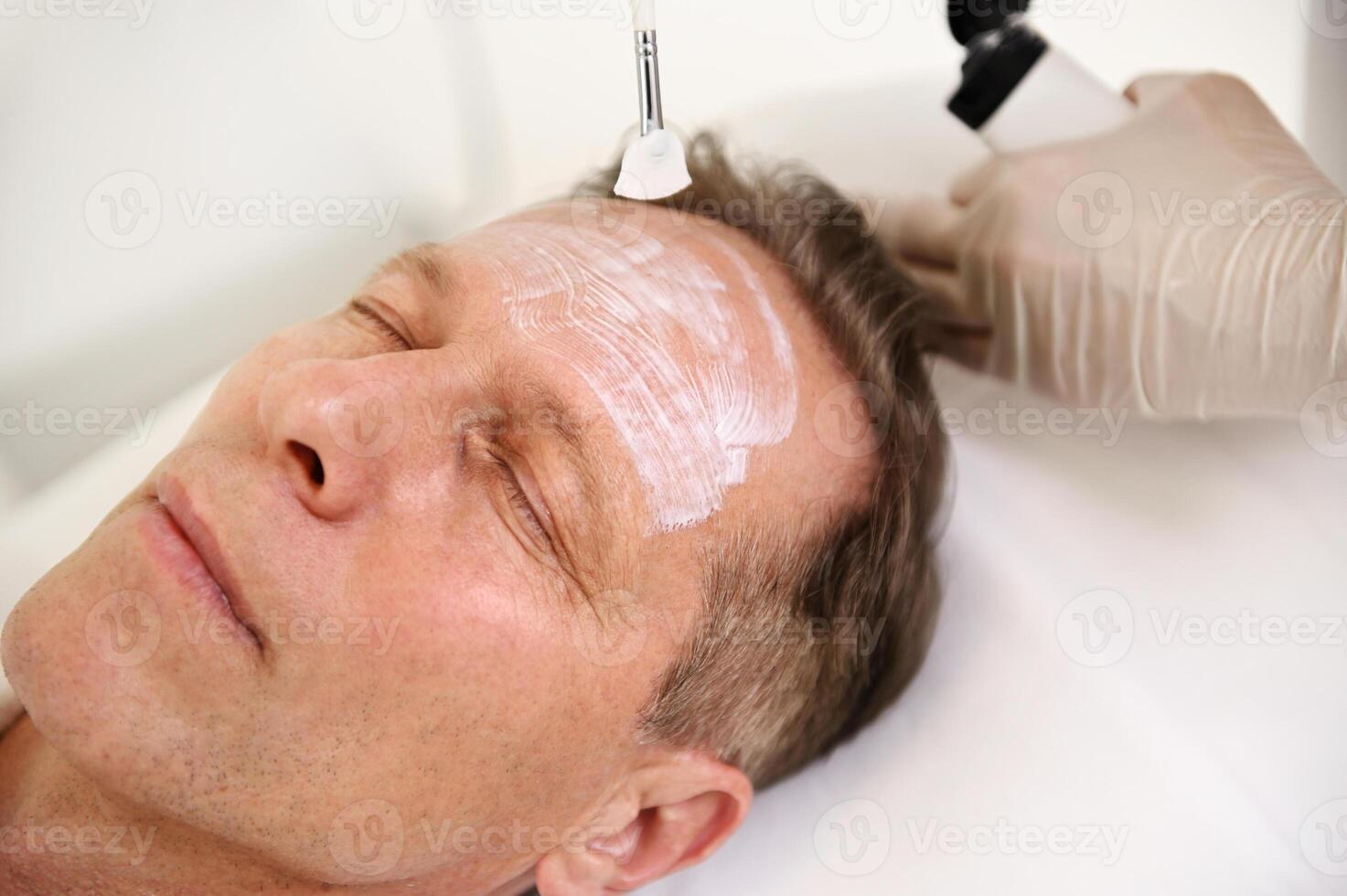 Headshot. Close-up of a handsome mature 50 years old man with 