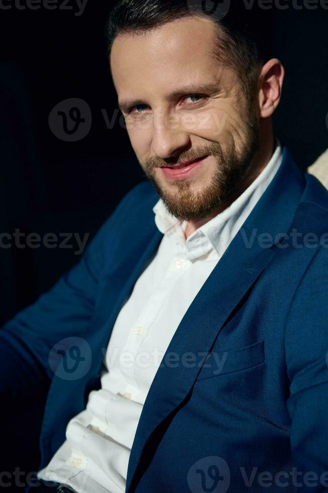 Headshot, close-up portrait of attractive handsome successful charming young businessman, entrepreneur, developer, investor wearing business suit and smiling cute looking at camera photo