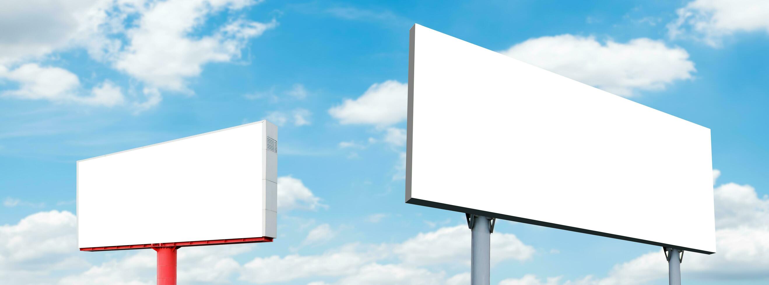 Two pole outdoor billboard with blue sky background photo