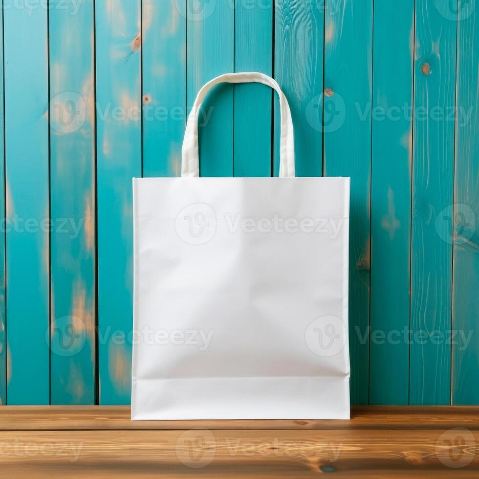 Blank white tote bag mockup isolated on rustic wooden planks. photo
